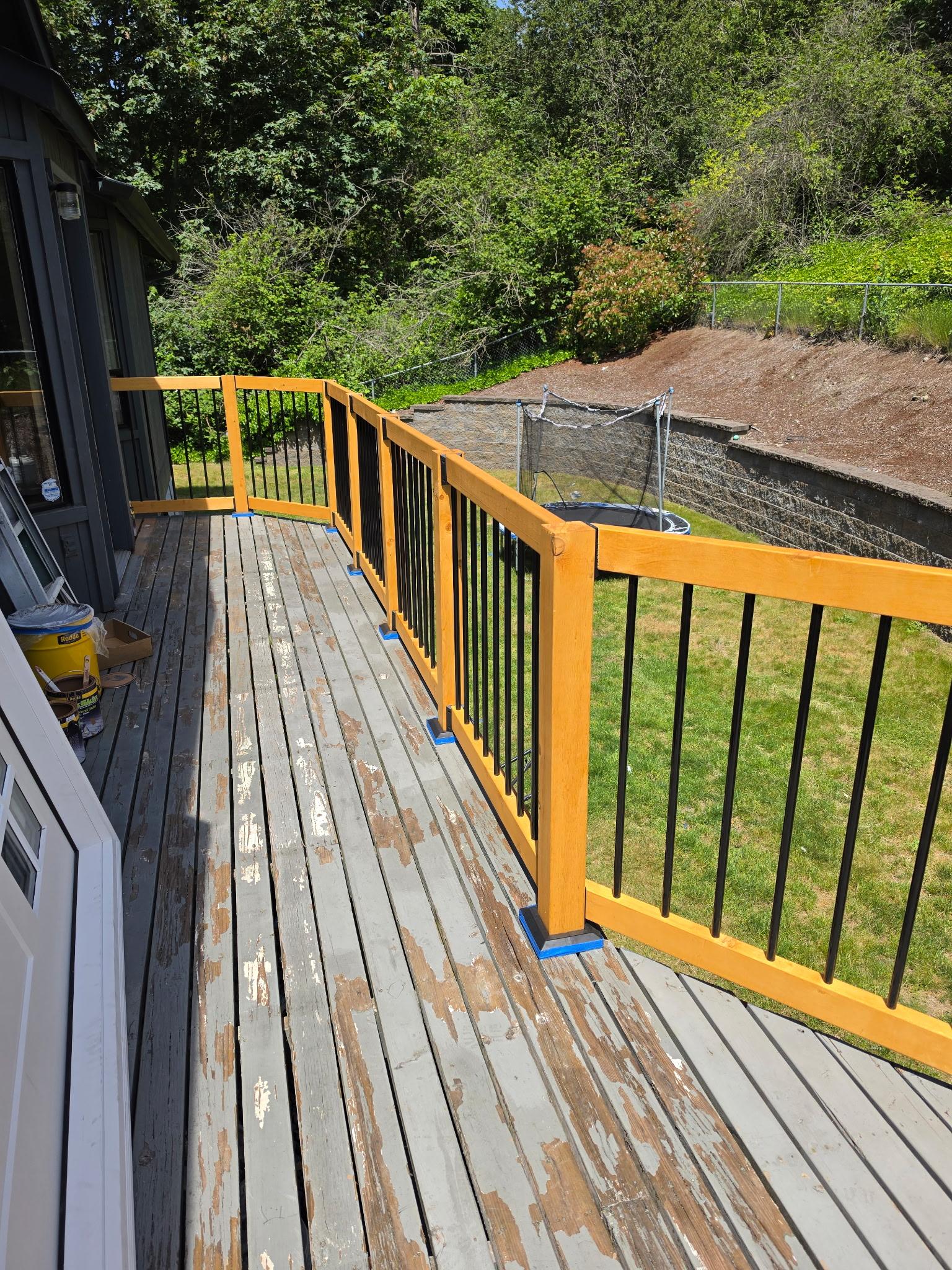 New cedar railing with black metal balusters