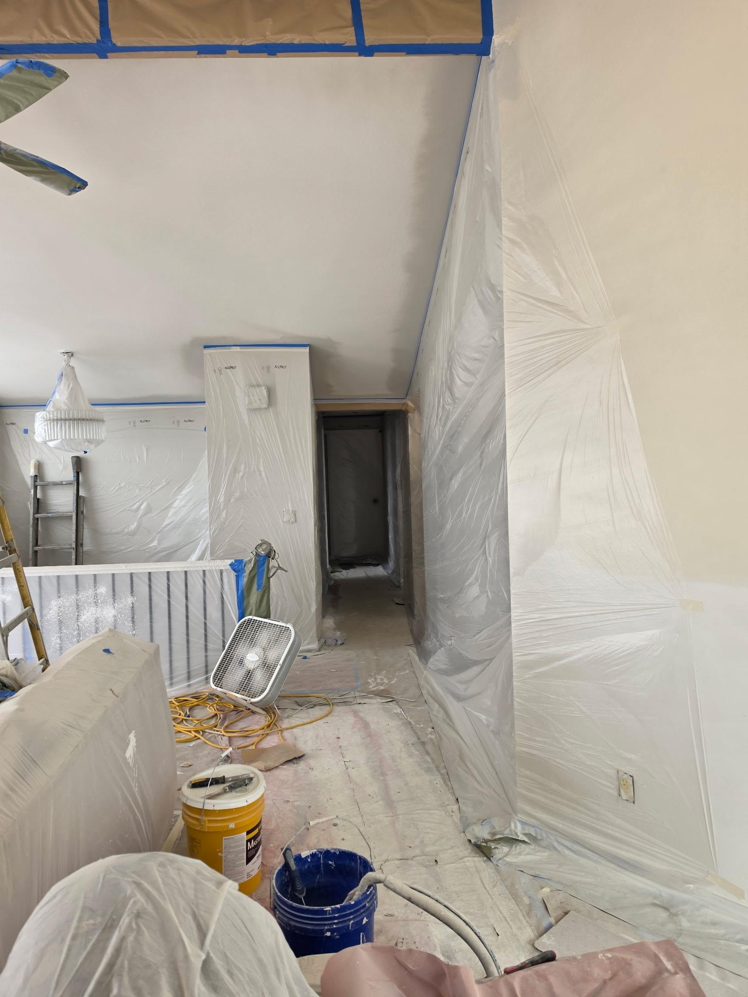 Protective masking before interior paint